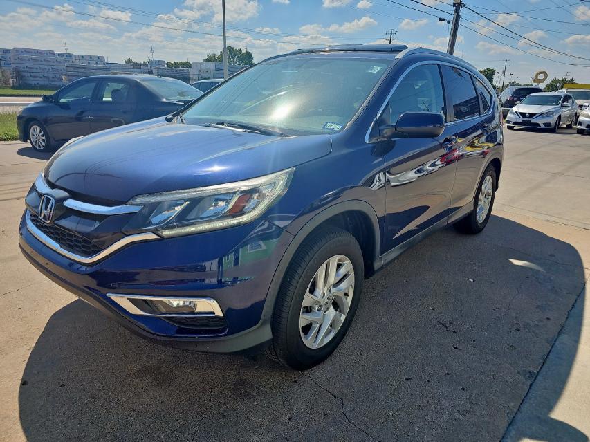 Photo 2 from auction – 2015 HONDA CR-V EXL with VIN 2HKRM3H77FH552346