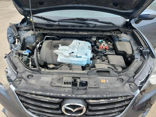 Photo 11 from auction – 2016 MAZDA CX-5 TOURING with VIN JM3KE2CY5G0824794