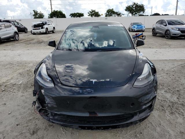 Photo 5 from auction – 2023 TESLA MODEL 3 with VIN 5YJ3E1EAXPF452605