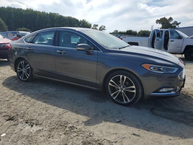 Photo 4 from auction – 2017 FORD FUSION TITANIUM with VIN 3FA6P0K9XHR212634