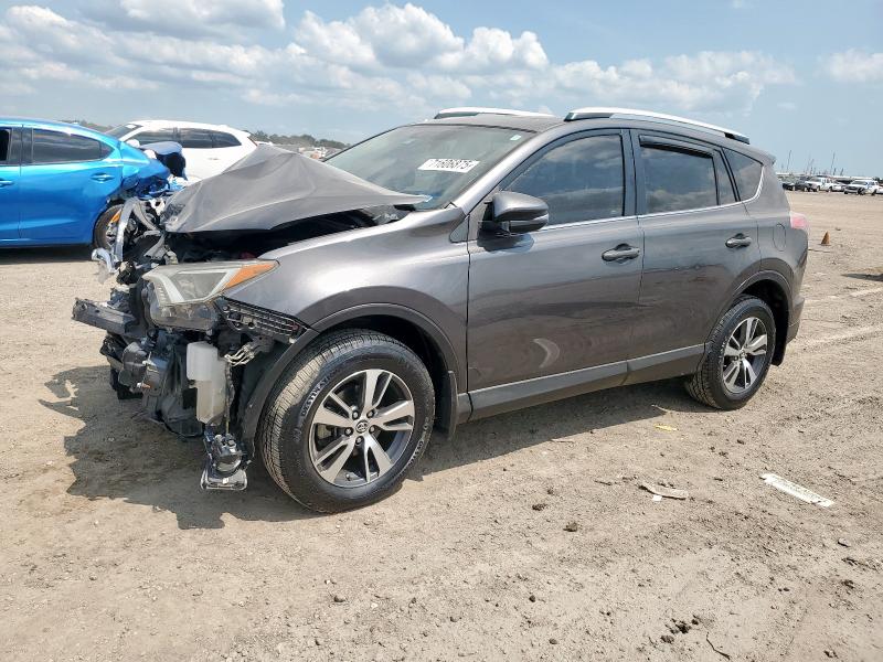 Photo 1 from auction – 2016 TOYOTA RAV4 XLE with VIN JTMWFREV2GJ068242