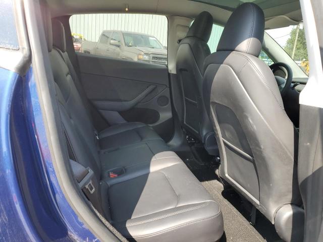 Photo 11 from auction – 2023 TESLA MODEL Y with VIN 7SAYGDEE4PF828061