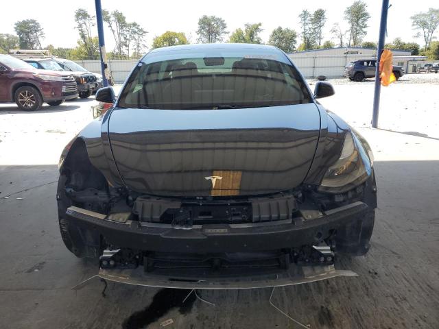 Photo 5 from auction – 2021 TESLA MODEL 3 with VIN 5YJ3E1EC5MF991792