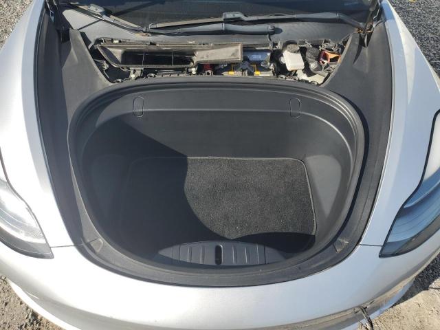 Photo 11 from auction – 2018 TESLA MODEL 3 with VIN 5YJ3E1EA3JF009610