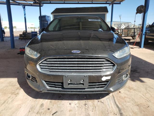 Photo 5 from auction – 2014 FORD FUSION TITANIUM PHEV with VIN 3FA6P0SUXER269299