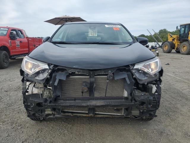 Photo 5 from auction – 2018 TOYOTA RAV4 LE with VIN 2T3BFREV0JW834623