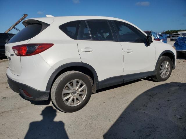 Photo 3 from auction – 2014 MAZDA CX-5 SPORT with VIN JM3KE2BE9E0425407