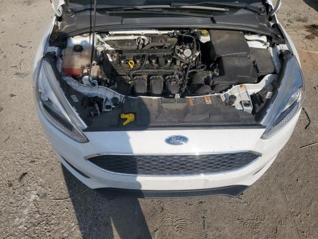 صورة رقم 11 من المزاد - 2018 FORD FOCUS S مع VIN 1FADP3E23JL221428