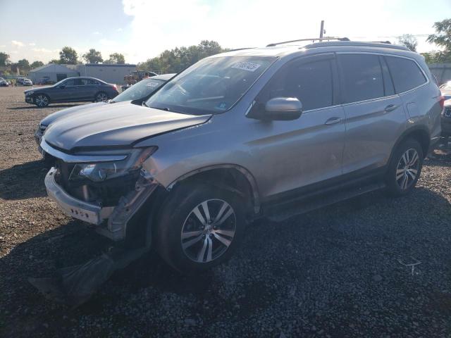HONDA PILOT EXL 2017 with VIN 5FNYF6H50HB010173 - Photo from auction