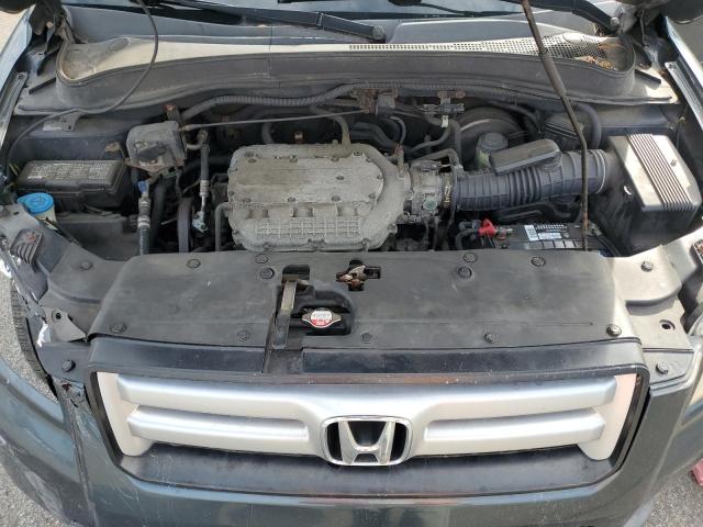 Photo 12 from auction – 2006 HONDA PILOT EX with VIN 2HKYF18596H504713