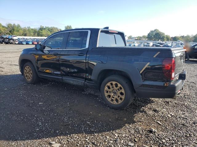 Photo 2 from auction – 2022 HONDA RIDGELINE with VIN 5FPYK3F50NB001036
