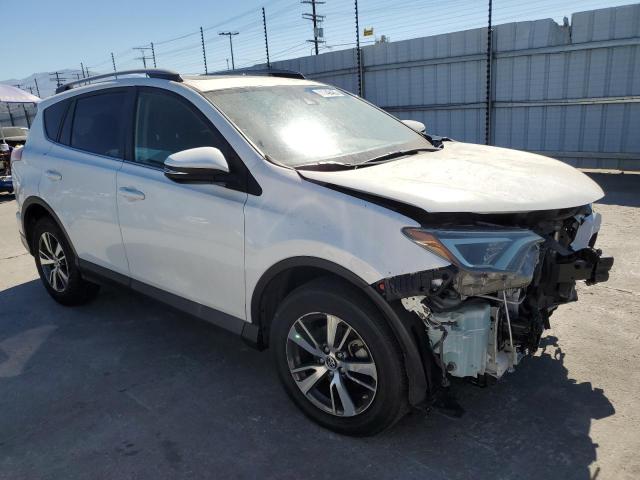 Photo 4 from auction – 2017 TOYOTA RAV4 XLE with VIN JTMWFREV0HJ127628