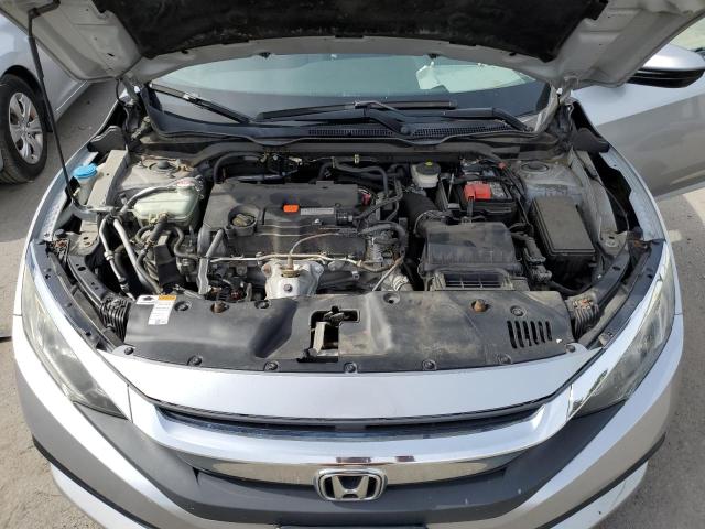 Photo 11 from auction – 2018 HONDA CIVIC LX with VIN 2HGFC2F55JH584023