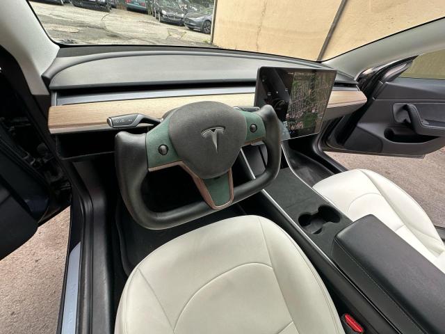 Photo 12 from auction – 2018 TESLA MODEL 3 with VIN 5YJ3E1EB3JF129836