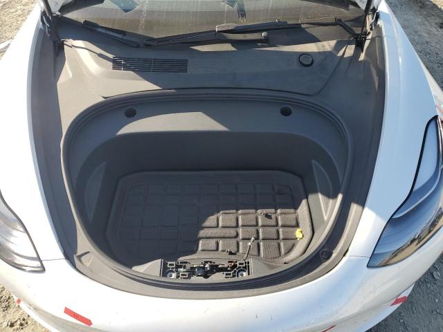 Photo 11 from auction – 2023 TESLA MODEL 3 with VIN 5YJ3E1EA9PF603269