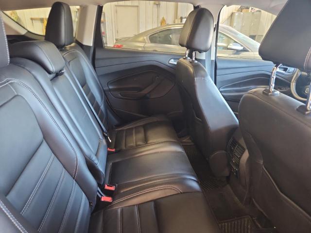 Photo 11 from auction – 2017 FORD ESCAPE TIT with VIN 1FMCU9J90HUA46981