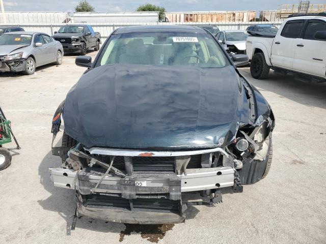 Photo 5 from auction – 2015 FORD TAURUS SE with VIN 1FAHP2D81FG105176