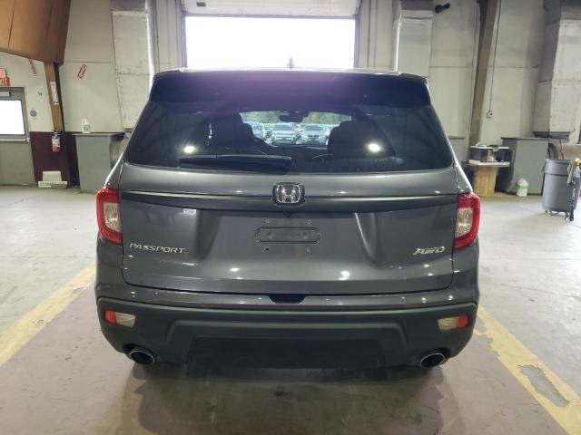 Photo 6 from auction – 2021 HONDA PASSPORT E with VIN 5FNYF8H53MB011288