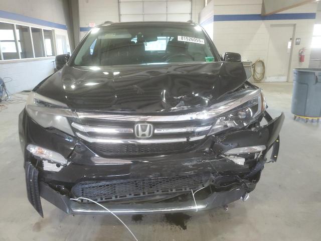 Photo 5 from auction – 2017 HONDA PILOT TOURING with VIN 5FNYF6H99HB039125