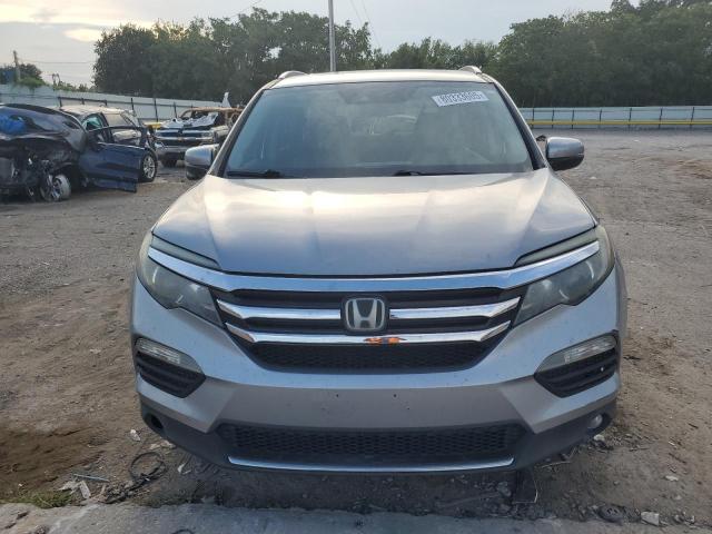 Photo 5 from auction – 2017 HONDA PILOT TOURING with VIN 5FNYF6H94HB047892