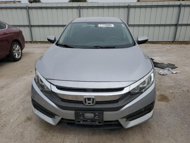 Photo 5 from auction – 2016 HONDA CIVIC LX with VIN 19XFC2F52GE043661