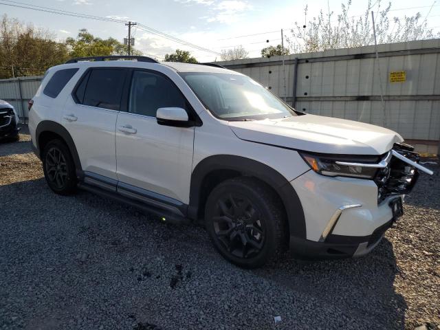 Photo 4 from auction – 2025 HONDA PILOT TOURING with VIN 5FNYG1H76SB044787