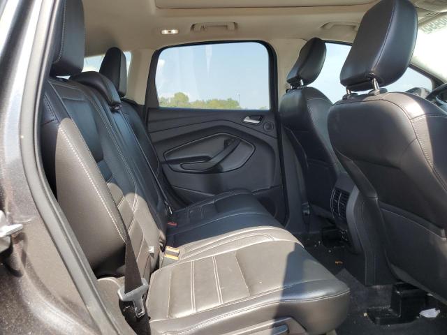 Photo 11 from auction – 2018 FORD ESCAPE TITANIUM with VIN 1FMCU0J93JUD36648