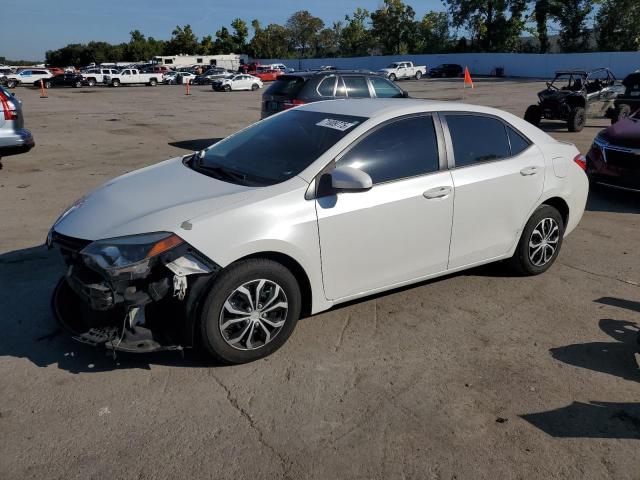 TOYOTA COROLLA EC 2015 with VIN 5YFBPRHE3FP282254 - Photo from auction