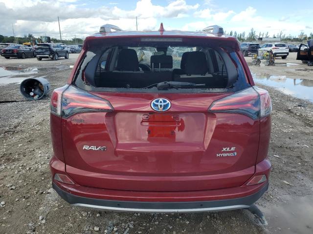 Photo 6 from auction – 2018 TOYOTA RAV4 HV with VIN JTMRJREV0JD238518
