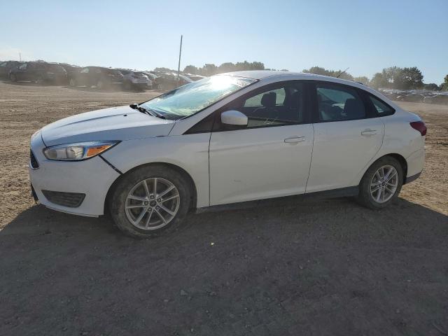 FORD FOCUS SE 2018 with VIN 1FADP3F25JL321240 - Photo from auction