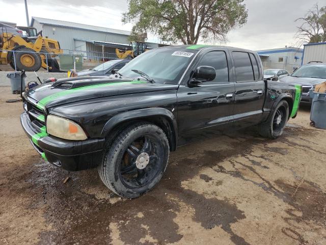 DODGE DAKOTA 2001 with VIN 1B7GL2AX31S176415 - Photo from auction