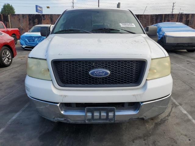 Photo 5 from auction – 2004 FORD F150 with VIN 1FTPX12534NA00513