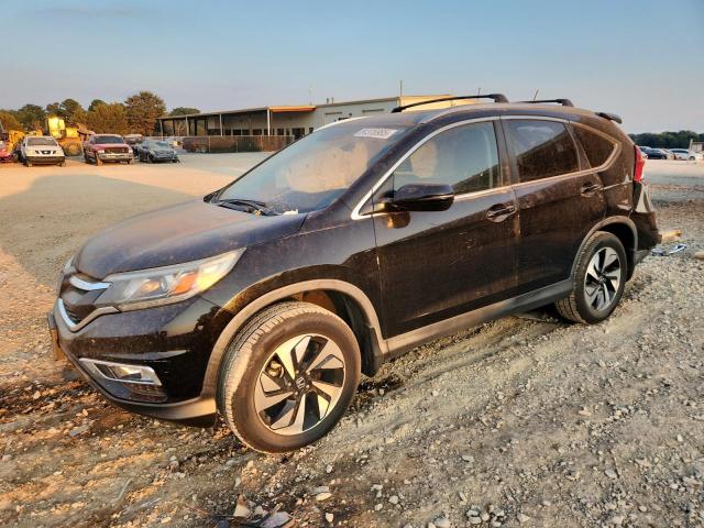 HONDA CR-V TOURI 2016 with VIN 5J6RM4H93GL012247 - Photo from auction