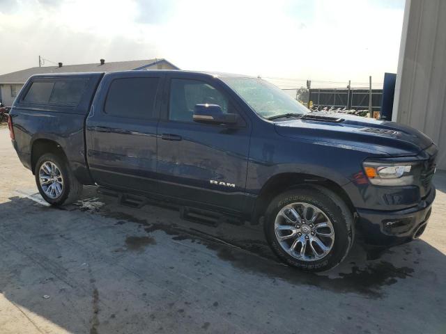Photo 4 from auction – 2023 RAM 1500 LARAM with VIN 1C6SRFJT5PN666754