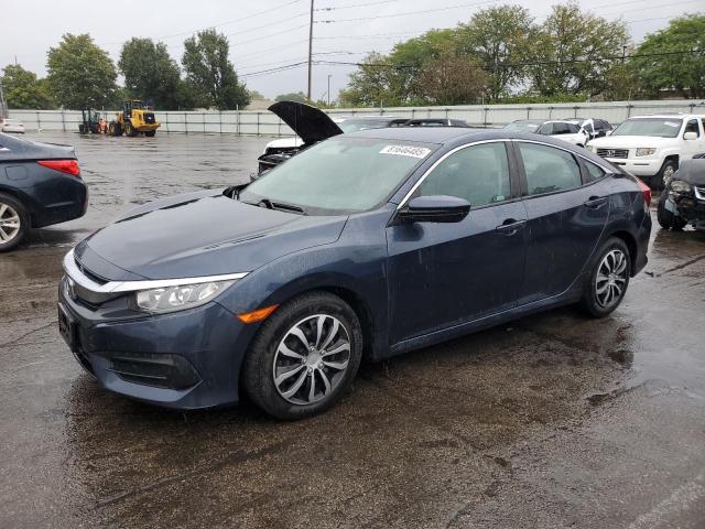 HONDA CIVIC LX 2018 with VIN 19XFC2F56JE044268 - Photo from auction