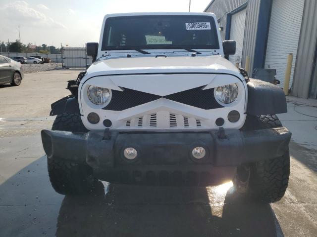Photo 5 from auction – 2016 JEEP WRANGLER U with VIN 1C4BJWDG1GL301336