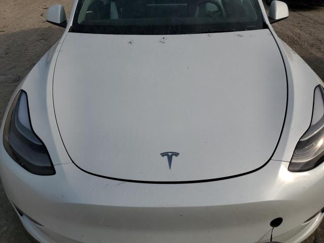 Photo 11 from auction – 2022 TESLA MODEL Y with VIN 7SAYGDEFXNF452780