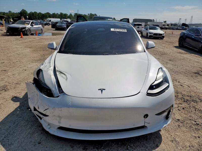 Photo 5 from auction – 2021 TESLA MODEL 3 with VIN 5YJ3E1EA7MF025958