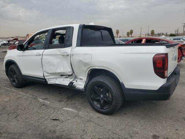 Photo 2 from auction – 2023 HONDA RIDGELINE with VIN 5FPYK3F87PB000494