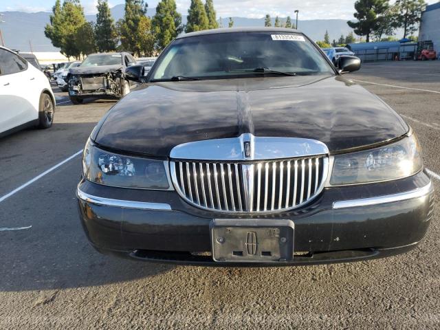 Photo 5 from auction – 2002 LINCOLN TOWN CAR C with VIN 1LNHM83W42Y645451