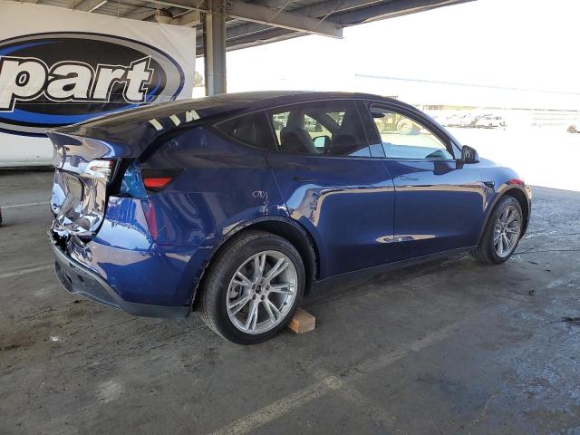 Photo 3 from auction – 2023 TESLA MODEL Y with VIN 7SAYGDEEXPF967210