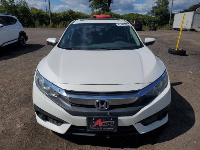 Photo 5 from auction – 2018 HONDA CIVIC EX with VIN 2HGFC2F82JH005614