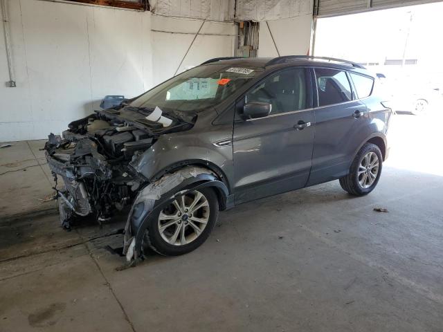 FORD ESCAPE SE 2018 with VIN 1FMCU9GD2JUC88494 - Photo from auction