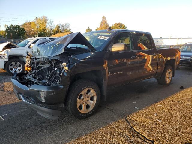 CHEVROLET SILVERADO 2018 with VIN 3GCUKREC3JG299046 - Photo from auction