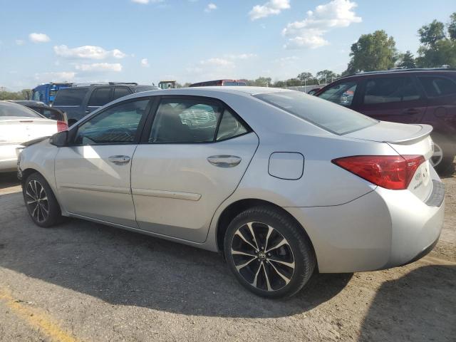 Photo 2 from auction – 2018 TOYOTA COROLLA L with VIN 5YFBURHE0JP758459