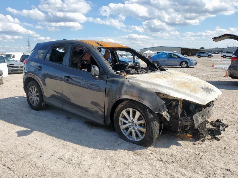 Photo 4 from auction – 2014 MAZDA CX-5 with VIN JM3KE2CY8E0324867