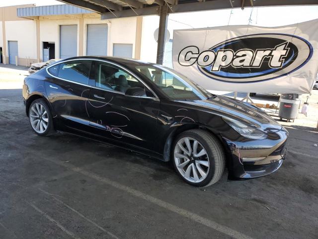 Photo 4 from auction – 2019 TESLA MODEL 3 with VIN 5YJ3E1EA5KF412554