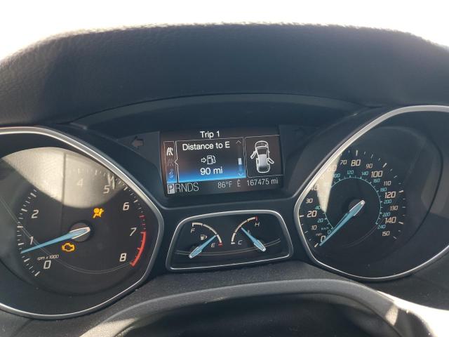 Photo 9 from auction – 2012 FORD FOCUS TITA with VIN 1FAHP3J21CL409908
