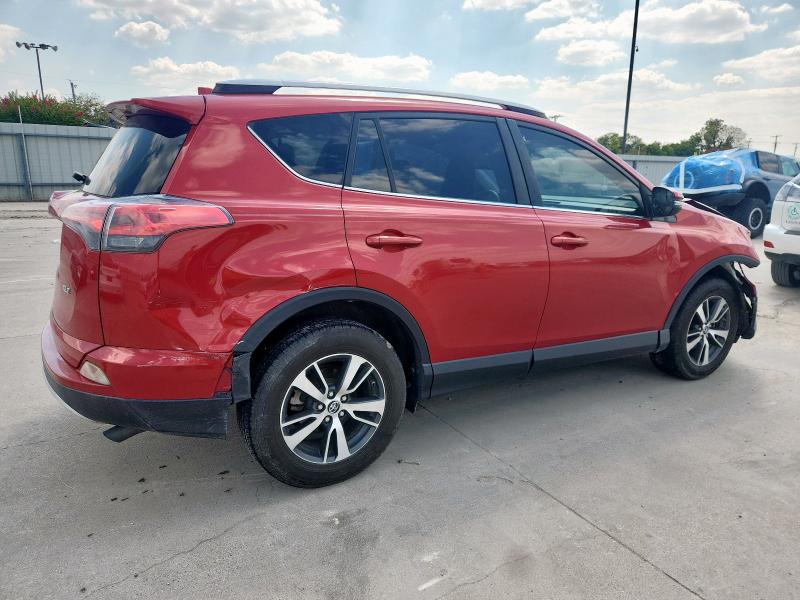 Photo 3 from auction – 2016 TOYOTA RAV4 XLE with VIN JTMWFREV4GJ084006