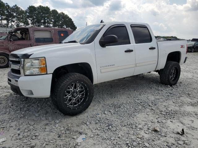 CHEVROLET SILVERADO 2011 with VIN 3GCPKSE31BG210290 - Photo from auction